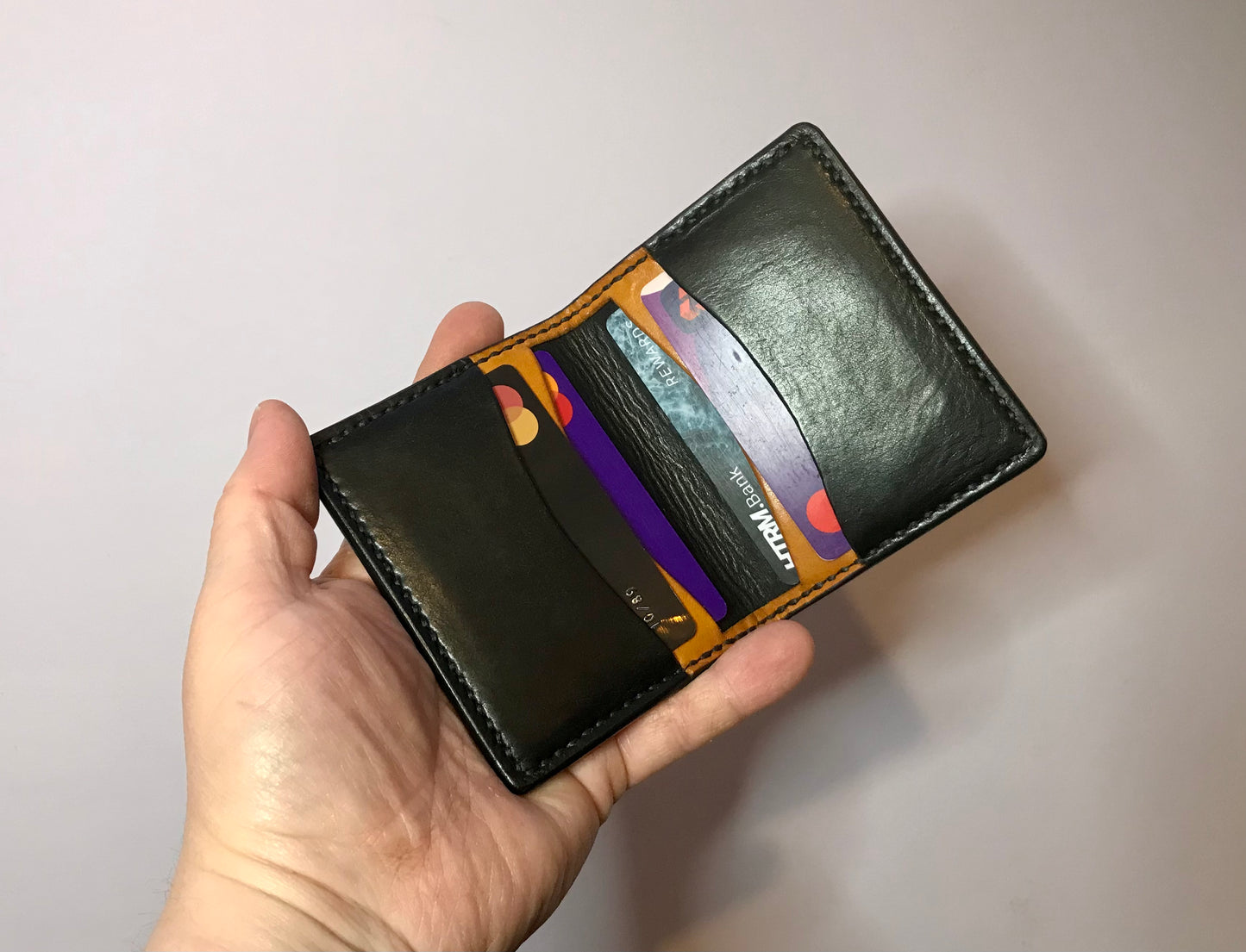 The Rugged Wallet in Chrisy’s Signature Black and Yellow