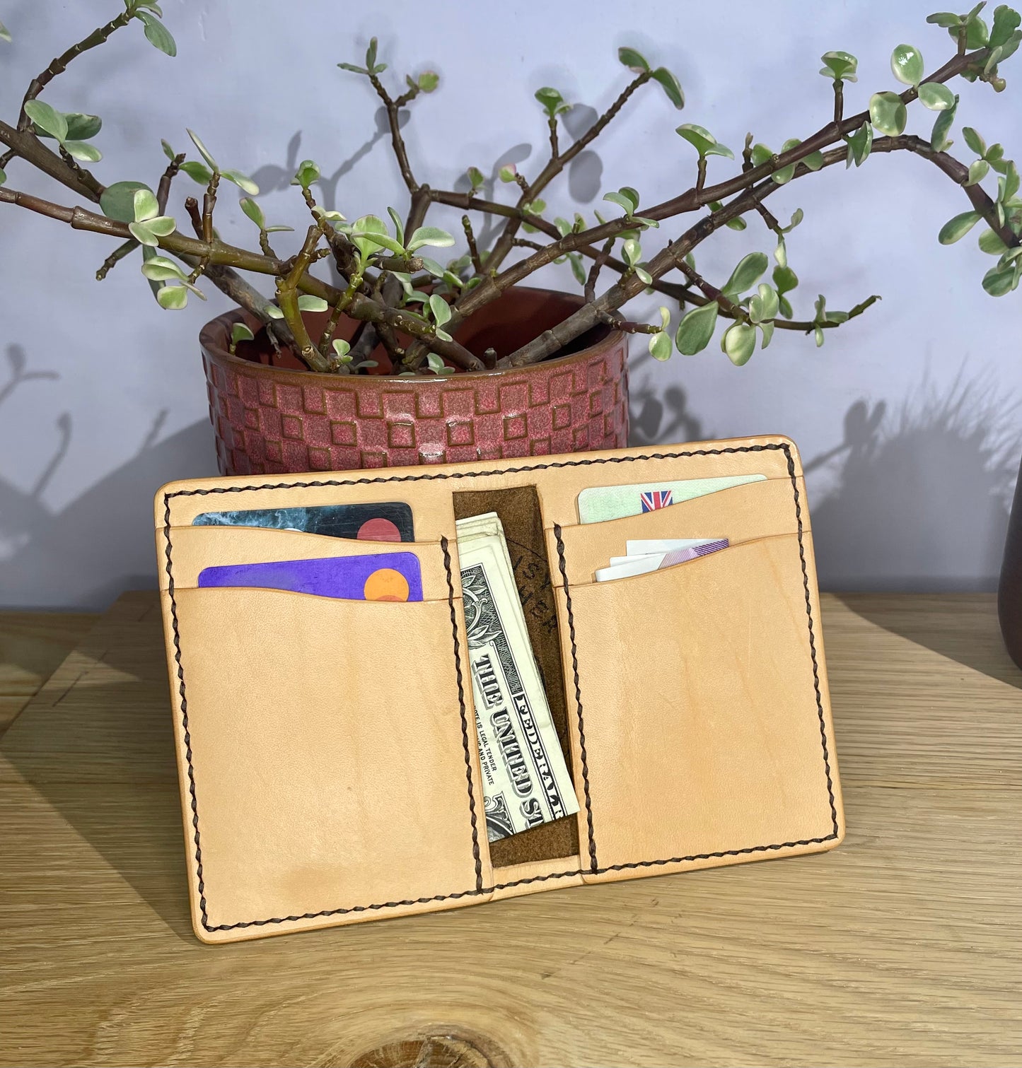 The Corter Leather and Cloth Designed Vertical wallet.