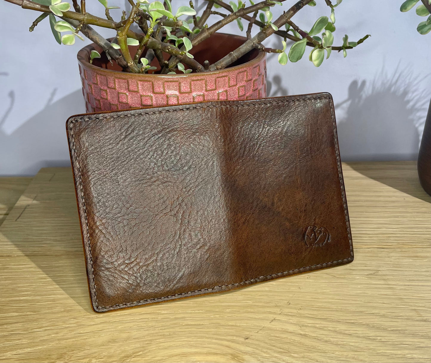 The Corter Leather and Cloth Designed Vertical wallet.