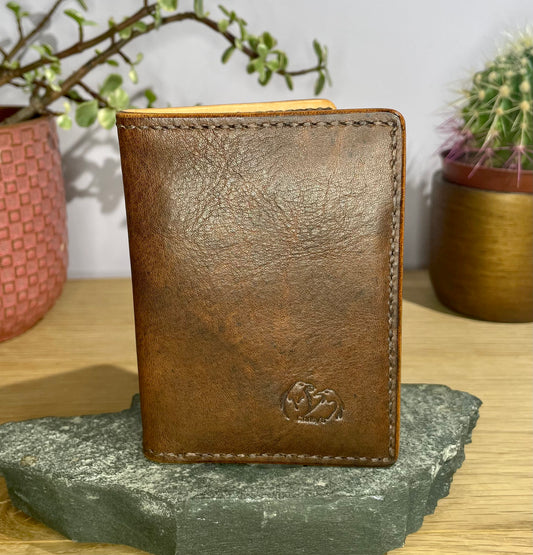 The Corter Leather and Cloth Designed Vertical wallet.